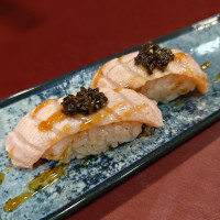 Salmón flameado con salsa trufa